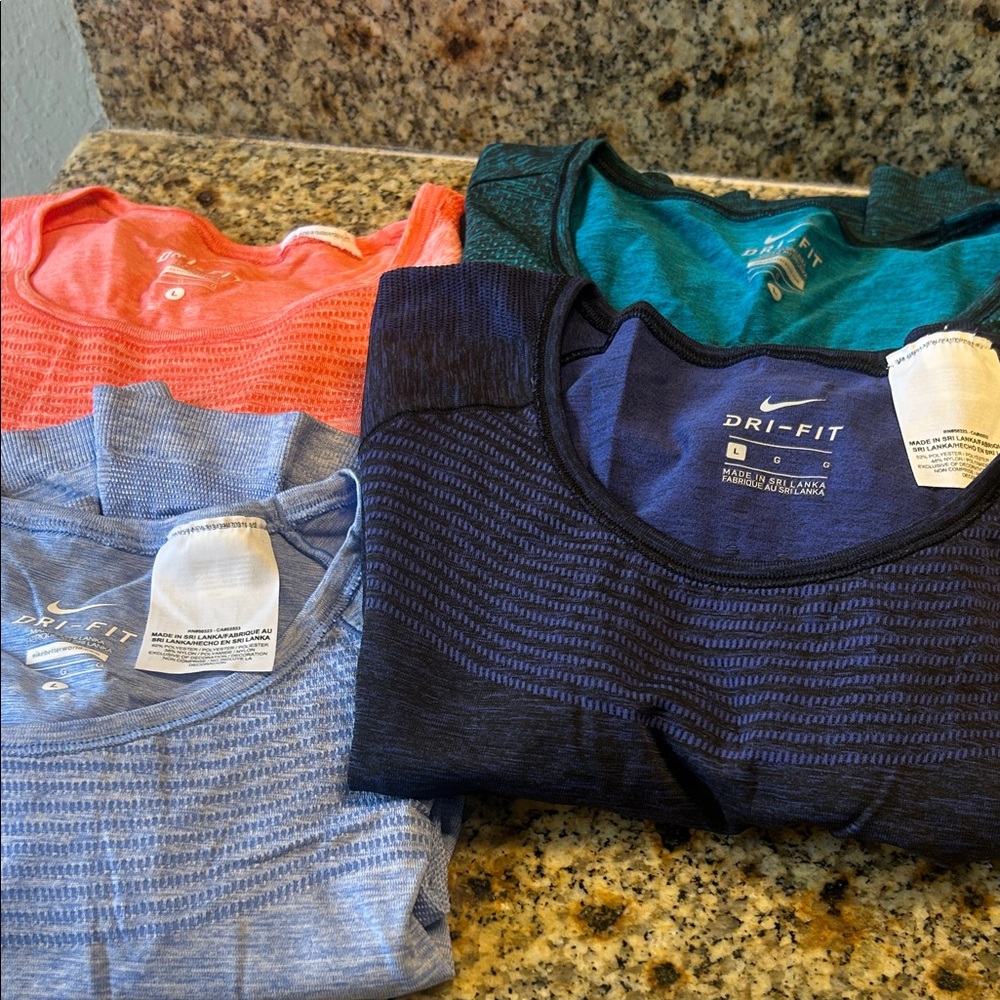 Women’s Nike seamless dri fit tops